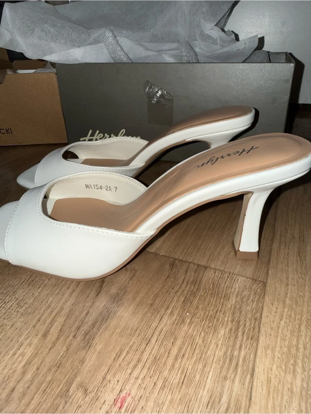 Brand new white slip on heels